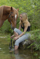 riding girl in river