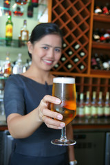 bartender giving the beer