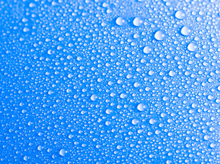 Blue water drops background texture