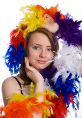 Young girl wearing feathers