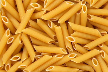 Penne rigate pasta background