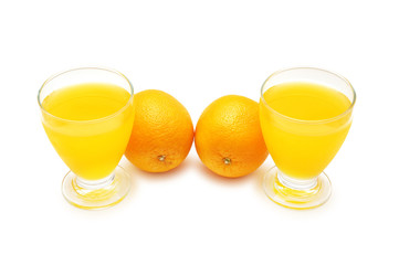 Twi oranges and orange  juice isolated on white