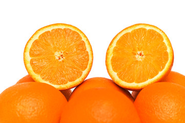 Two half-cut oranges isolated on the white background