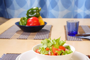 Table with salad bowls