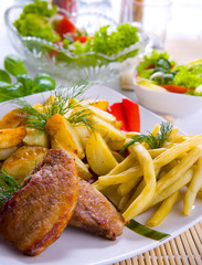 Delicious rissole with potatoes and salad