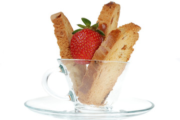 Bisquits in coffee cup with strawberry