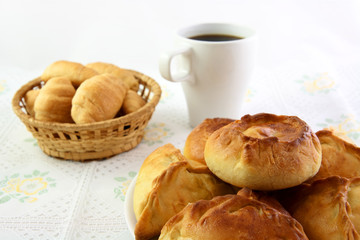 Meat pie, croissant and cup of coffee