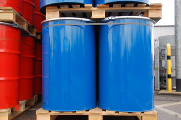 Red and blue oil barrels