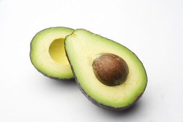 a cut avocado  with put showing 