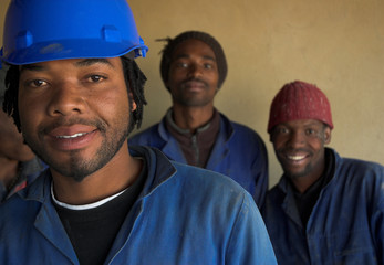 Three construction workers