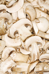 slices of cultivated mushroom shot from above