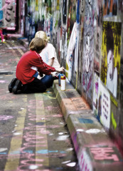 Graffiti Kids -Two boy spray Graffiti at CANS in London