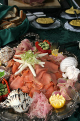 Decorative salmon food on plate with sea stars