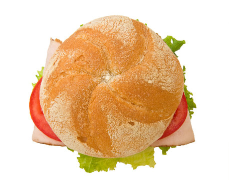 Top view of a crusty turkey kaiser sandwich