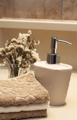Stack of towels and soap in the bathroom