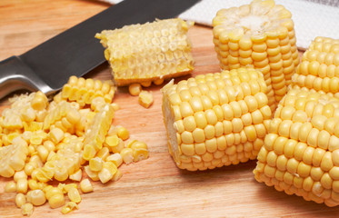Corn kernels on the wooden board