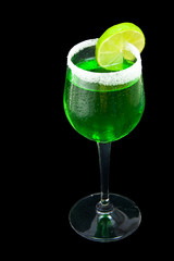 Lime and vodka cocktail isolated on black background