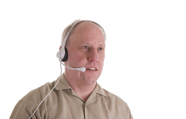 Man in Brown Shirt with Phone Headset