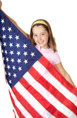 Pretty girl holding the American Flag with a big smile