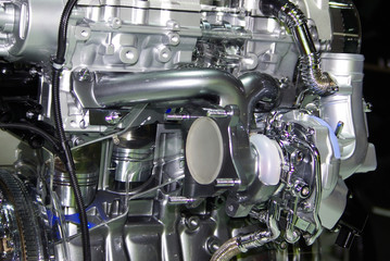 Part of components, in cut, of an engine of automobile.