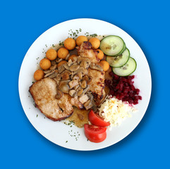 Fried Meat under Champions on the Blue Table