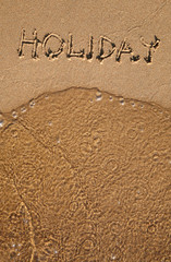 Holiday. Word on the Sandy Beach