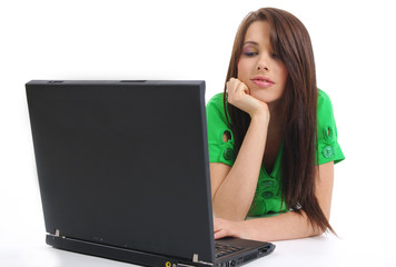 Beautiful girl using Laptop on floor