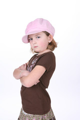 Fototapeta premium Cute girl with her ams crossed and pouting 