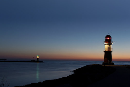 Two lighthouses after sunset