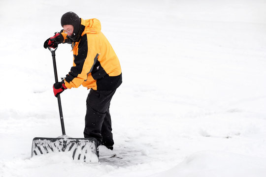 Man Shoveling Snow