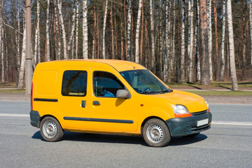 yellow van on road
