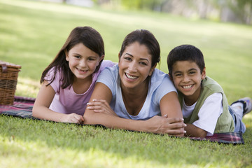 Mother and children having picnic