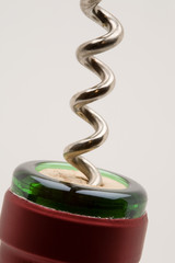 opening a wine bottle