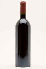 isolated red wine bottle