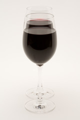 isolated wineglasses with red wine