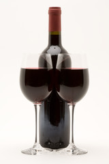 red wine bottle with two glasses of red wine