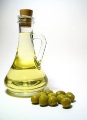 Olive and olive oil in carafe