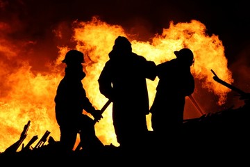 Fototapeta premium Fire fighters and huge flames