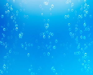 Fototapeta na wymiar Air bubbles rising to the surface