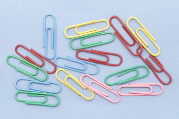 paperclips on blue
