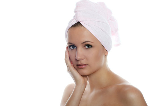 beauty portrait of a beautiful young woman with a towel