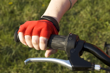 Cyclist's hand in red gloves