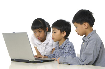 kids playing computer games or learning online