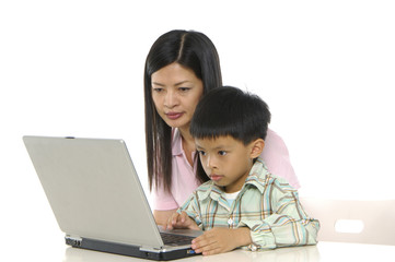 kids playing computer games or learning online