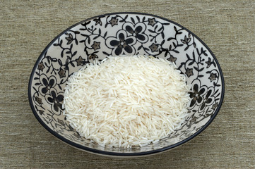 bowl of rice on a linen sack