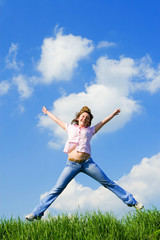 happy young woman is jumping