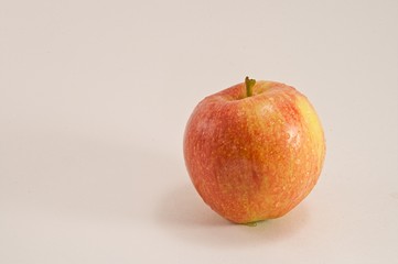 A single apple, on white