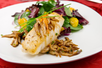 Sea bass with shiitake mushrooms and salad