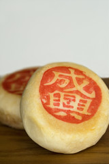 Close up of traditional Chinese pastries with Chinese characters