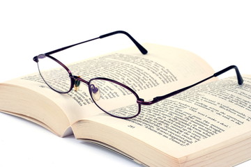 Book and an eyeglasses